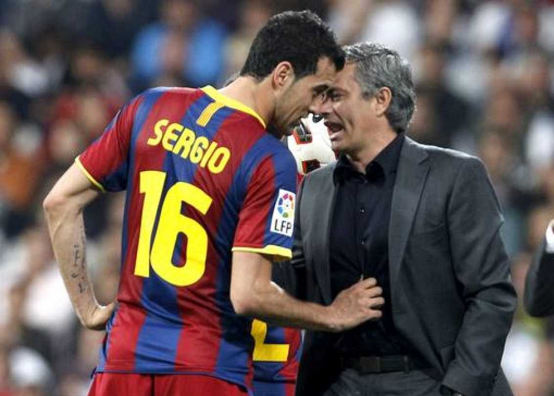 Busquets y Mourinho.